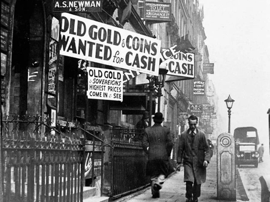 Shopfronts on Hatton Garden advertising old gold and coins wanted for cash